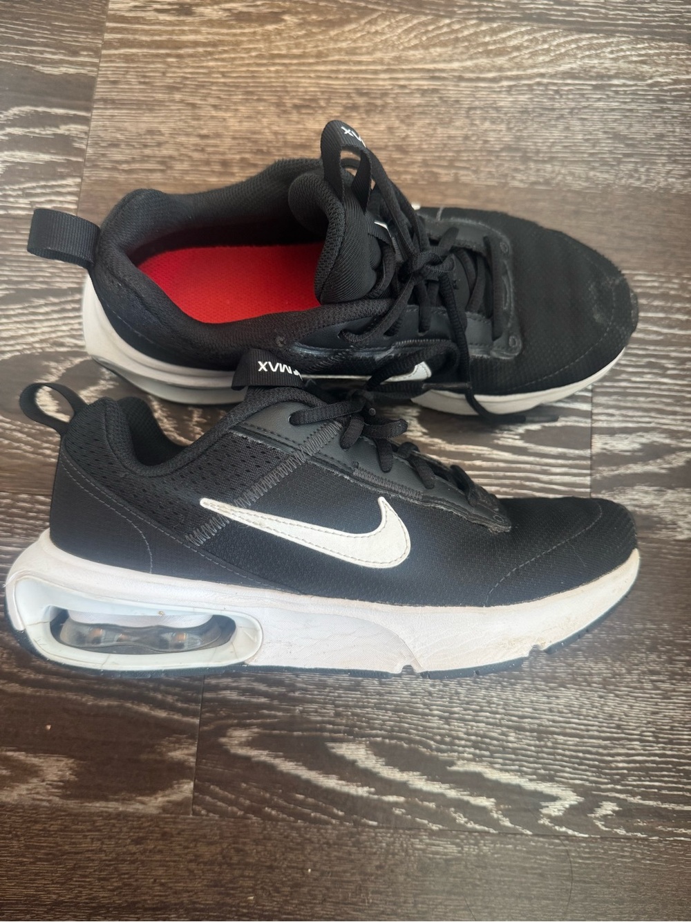 Nike Kids Black Sneakers with White Swoosh and White Sole